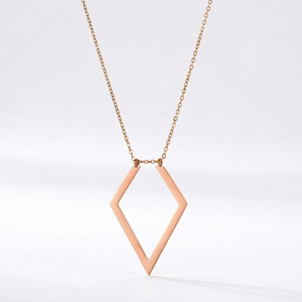 Rose gold diamond-shaped necklace on a white background