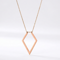 Rose gold diamond-shaped necklace on a white background