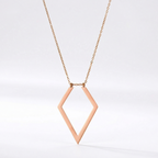 Rose gold diamond-shaped necklace on a white background